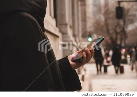 people walking around town 111099059