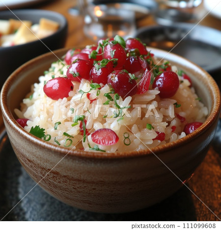 cooked rice with cranberries in a plate 111099608