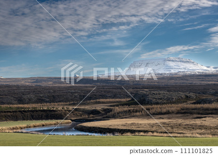 River and a mountain, Borgarfjordur, Iceland. 111101825