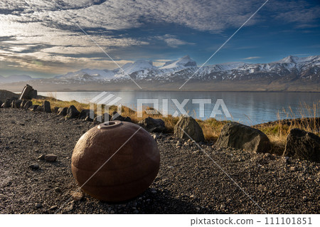 Iron sphere, fjord and mountains, Iceland 111101851