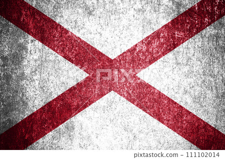 Close-up of the Alabama grunge state flag. Dirty Alabama state flag on a metal surface. Close-up of the Alabama grunge state flag. Dirty Alabama state flag on a metal surface. 111102014