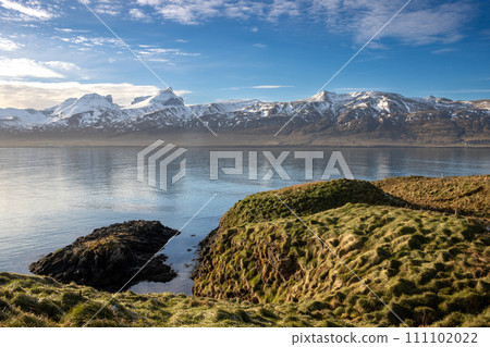 Fjord and snowy mountains in the autumn, North-East Iceland Fjord and snowy mountains in the autumn, North-East Iceland 111102022