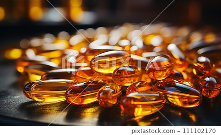 Close-up of golden Omega-3 fish oil capsules with reflections, illustrating the concept of natural health supplements. Close-up of golden Omega-3 fish oil capsules with reflections, illustrating the concept of natural health supplements. 111102170