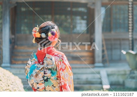 A woman in a kimono A woman in a kimono 111102187