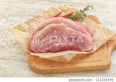 Raw pork schnitzel for roast 111103349