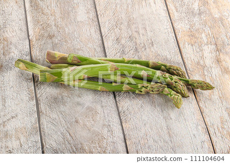 Fresh green asparagus - vegan cuisine Fresh green asparagus - vegan cuisine 111104604