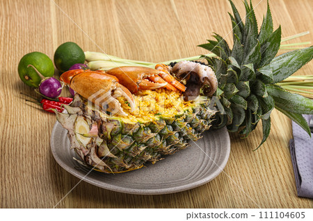 Rice with seafood in pineapple Rice with seafood in pineapple 111104605