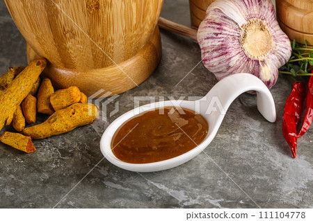 Indian curry sauce in the bowl 111104778