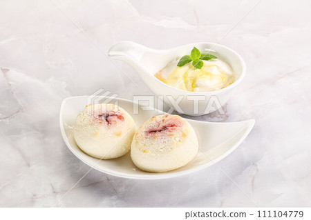 Curd pancakes with sour cream Curd pancakes with sour cream 111104779