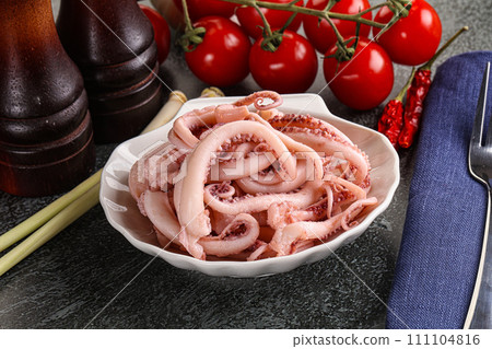 Delicous marinated squid tentacles in the bowl 111104816