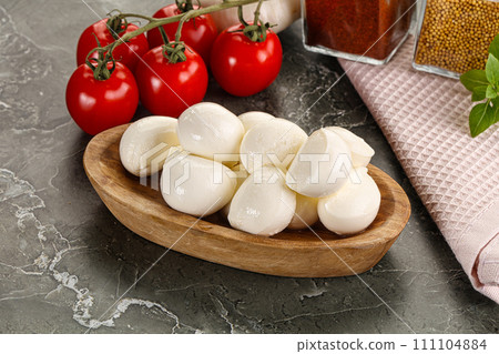 Mini mozarella cheese bolls heap 111104884