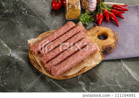 Raw beef kebab sausage for grill 111104891