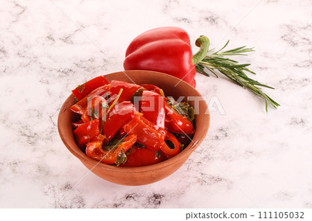 Pickled red bell pepper in the bowl Pickled red bell pepper in the bowl 111105032