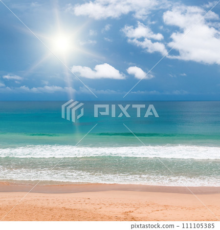 Tropical beach and sun on blue sky . 111105385