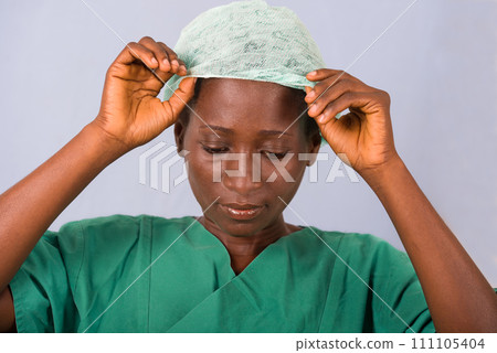 portrait of a young female doctor on a blue background. 111105404