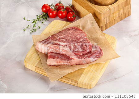 Uncooked raw beef steak for grill Uncooked raw beef steak for grill 111105545