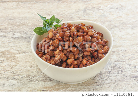 Boiled lentil in the bowl 111105613