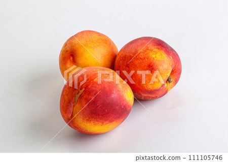 Ripe sweet juicy fresh red nectarines 111105746