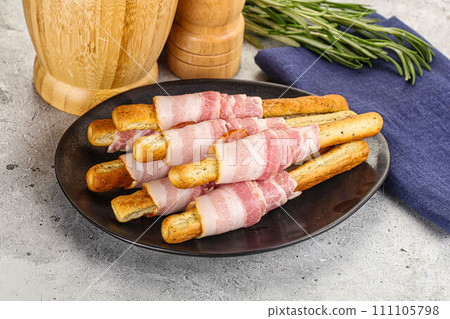 Crispy grissini italian bread with bacon 111105798