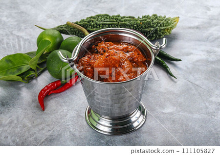 Indian cuisine - butter chicken with sauce 111105827