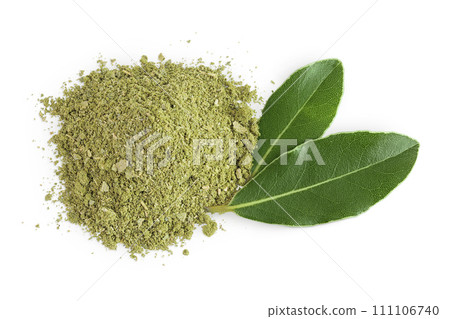 Fresh and ground Laurel leaves isolated on white background. Green bay leaf. Top view. Flat lay. 111106740