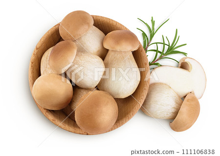 Fresh porcini cep mushroom isolated on white background in wooden bowl. Top view. Flat lay 111106838