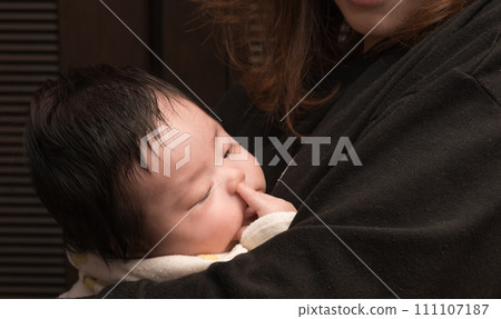 [Baby picking his nose] 111107187