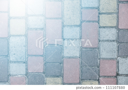 Surface of multi-colored paving slabs. Beautiful pattern, background close-up 111107880