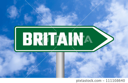 Britain road sign on blue sky background 111108640