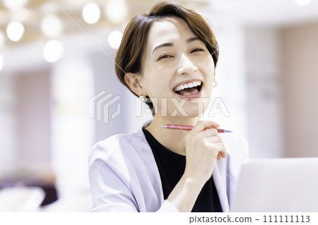 Office casual middle-aged woman using a laptop 111111113