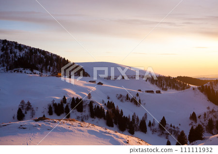 Sunset in the mountains with shelter in the foreground 111111932