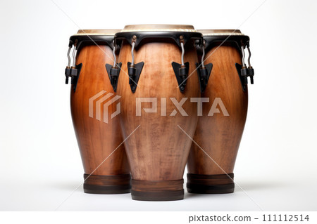 Three conga drums isolated on white background. Traditional percussion musical instrument of Afro-Cuban and Latin American culture. Suitable for music-related projects and cultural designs. Three conga drums isolated on white background. Traditional percussion musical instrument of Afro-Cuban and Latin American culture. Suitable for music-related projects and cultural designs. 111112514