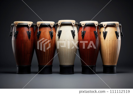 Five conga drums in row isolated on dark background. Traditional percussion musical instrument of Afro-Cuban and Latin American culture. Suitable for music-related projects and cultural designs. 111112519