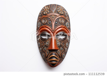 African ethnic ritual mask isolated on white background. Wooden Tribal Mask of warrior with carved ornaments. Blend of Tradition and Modernity. Traditions and customs of Africa. Travel souvenir. 111112539