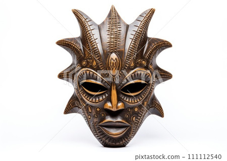 African ethnic tribal ritual mask isolated on white background. Wooden Tribal Mask of warrior with carved ornaments. Blend of Tradition and Modernity. Traditions and customs of Africa Travel souvenir African ethnic tribal ritual mask isolated on white background. Wooden Tribal Mask of warrior with carved ornaments. Blend of Tradition and Modernity. Traditions and customs of Africa Travel souvenir 111112540