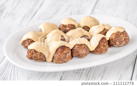 Swedish meatballs with cream sauce 111112778