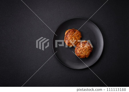 Delicious fresh fried minced fish cutlets with spices and herbs 111113188