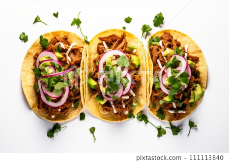Top view of mexican pork carnitas tacos with greens, avocado and onion isolated on white background Top view of mexican pork carnitas tacos with greens, avocado and onion isolated on white background 111113840
