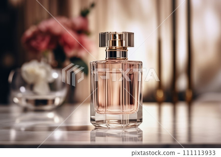Bottle of luxury essence perfume on the marble table on the blurred background with flowers Bottle of luxury essence perfume on the marble table on the blurred background with flowers 111113933