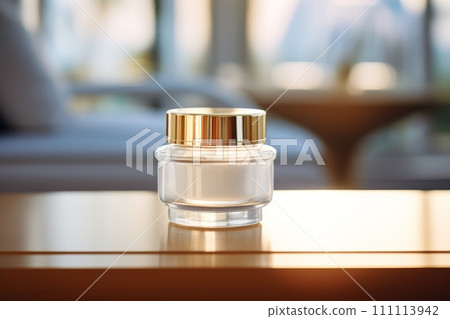 A jar of luxury cream with a golden lid in modern style on a wooden table. Beauty product concept 111113942