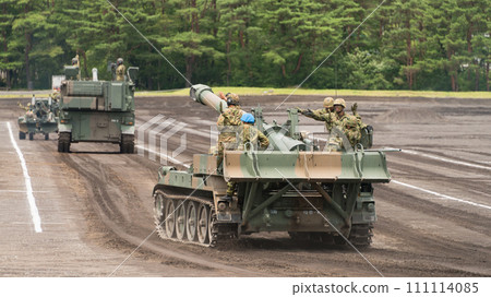 Japan Ground Self-Defense Force 203mm self-propelled howitzer in motion 111114085