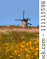 Historic wind mill at UNESCO world heritage site Kinderdijk in the Netherlands. 111115598