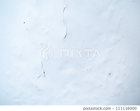 Cracked white paint on metal. Background from old paint. 111116000