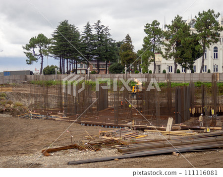 Construction of the foundation of a large complex. Workplace of builders. 111116081