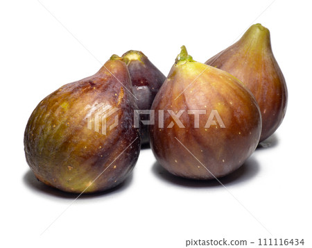 Ripe figs on a white background. Several figs. Southern fruit isolate. Purple fruit. Ripe figs on a white background. Several figs. Southern fruit isolate. Purple fruit. 111116434