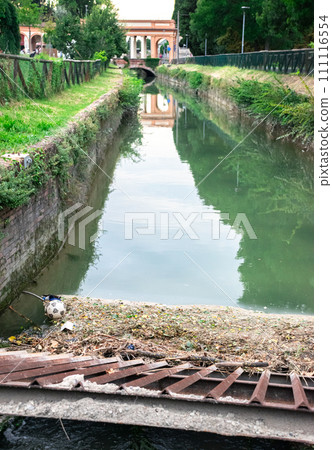 Polluted and dirty river consequence of city's human waste without control Polluted and dirty river consequence of city's human waste without control 111116554