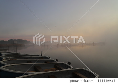 Lake shining in the morning sun 111116631