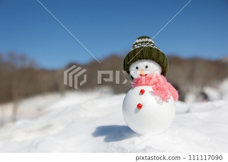 Ski resort and snowman on a sunny day Ski resort and snowman on a sunny day 111117090