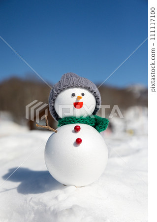 Ski resort and snowman on a sunny day Ski resort and snowman on a sunny day 111117100