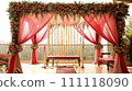 Elegant Wedding Mandap with Pastel Drapes and Hanging Rose Garlands 111118090